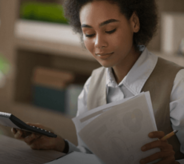 Woman reading documents 360x320